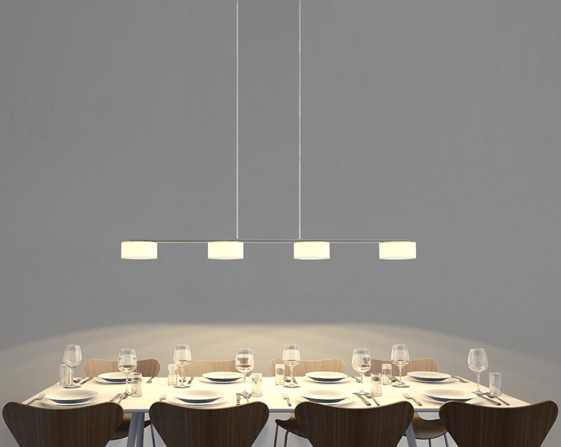 Iluminación acogedora para mesas largas de comedor